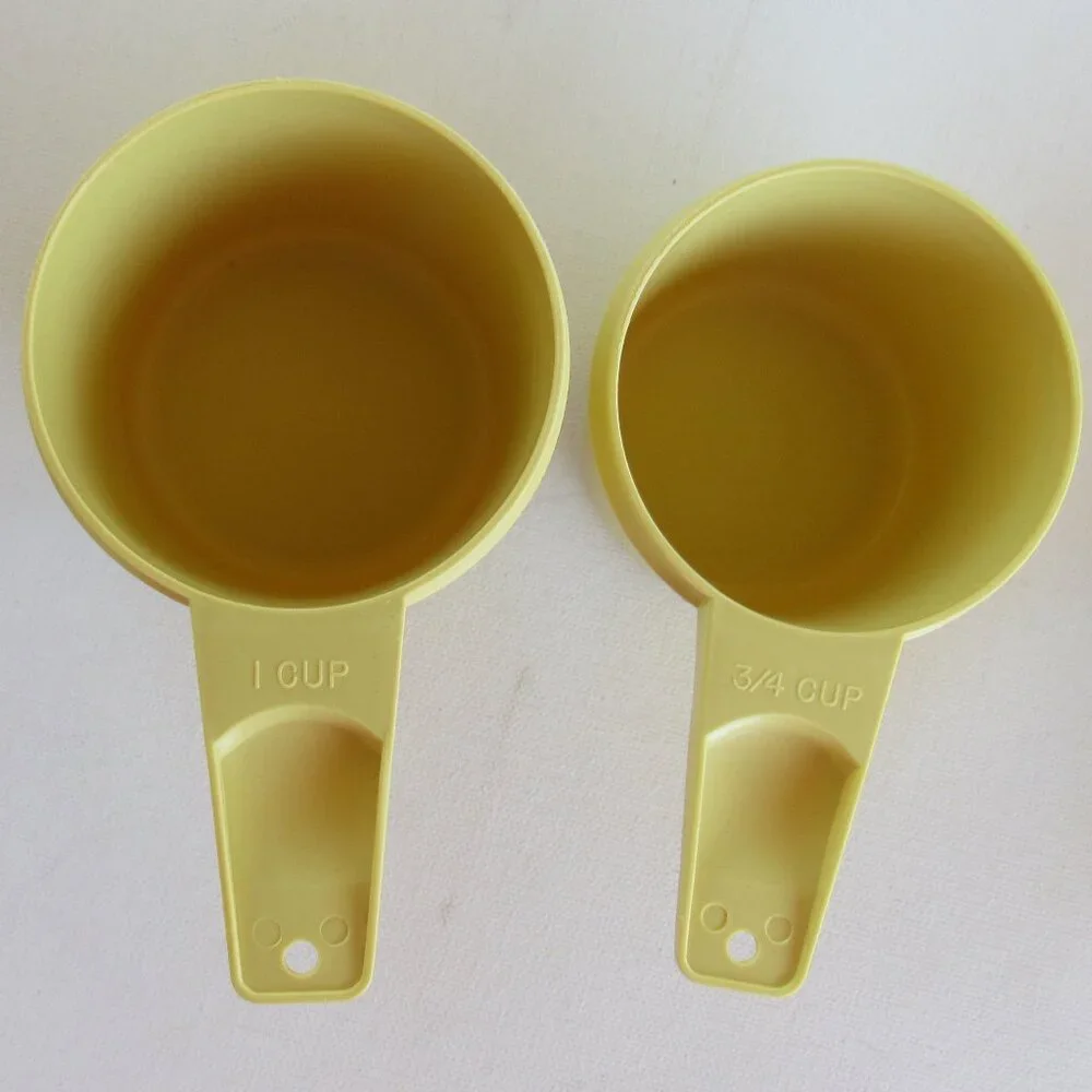 Vintage 1970s Tupperware Yellow Nesting Measuring Cup Set of 5 Made In U.S.A